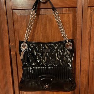 Coach patent leather shoulder bag.  Pink interior.  Chain and leather handles.